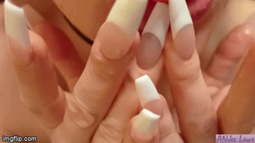 Long painted nails stroking hard
