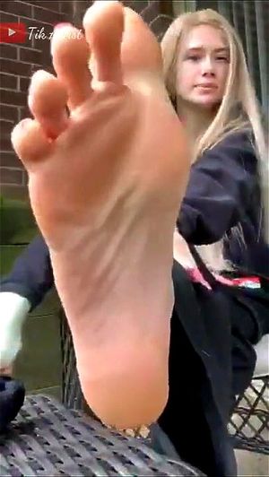 Blonde girl points toes tiny