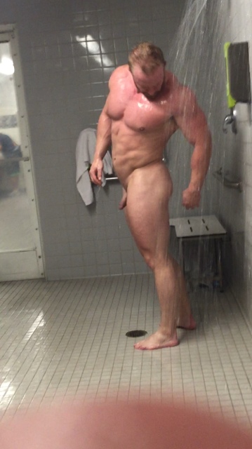 Locker room muscle bodybuilder showers