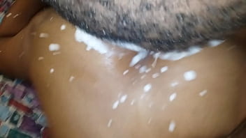 Oiled booty creaming while riding