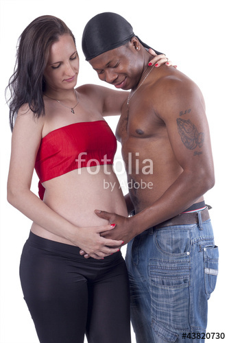 Pregnant white woman having black